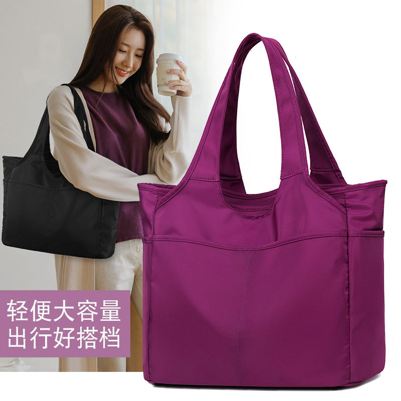 2026新款潮手提牛津布女包|多兜