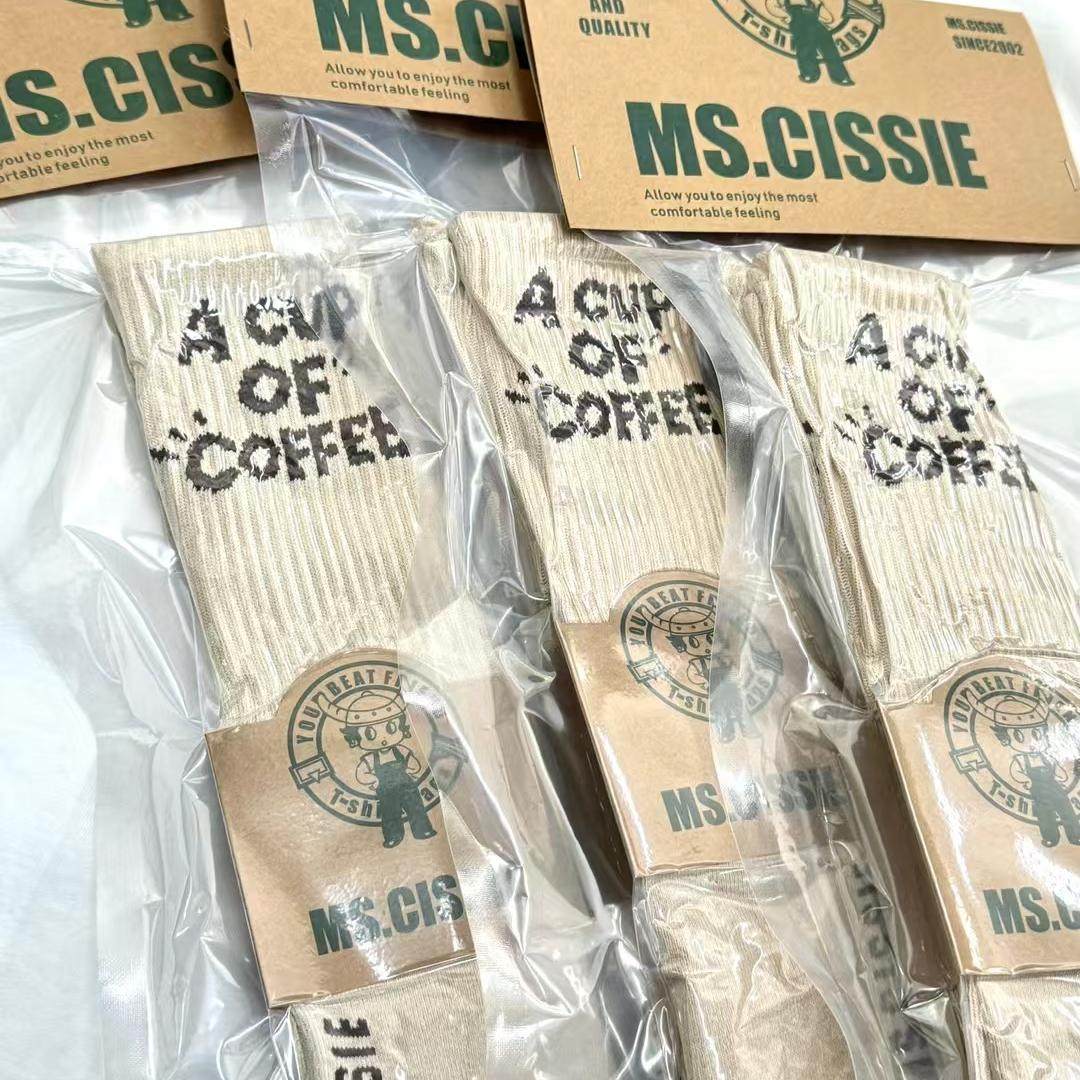 纸袋家牛牛系列冬季新款咖啡染中筒棉袜运动休闲时尚情侣款