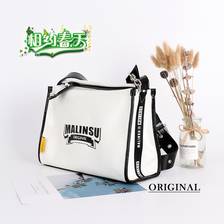 欧美时尚大容量字母油蜡牛皮包