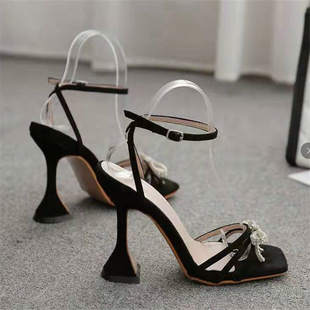 Wine glasses and plus size women's high-heeled sandals for