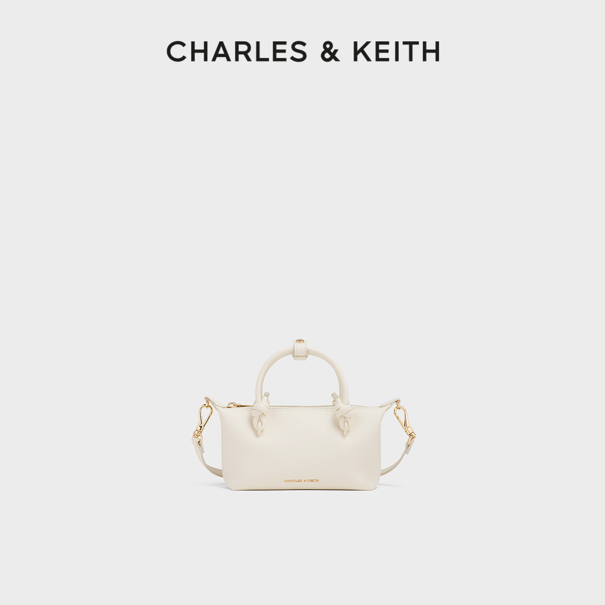 CHARLES&KEITH春季女包CK2-30271635绳结手提斜挎小方包饺子包