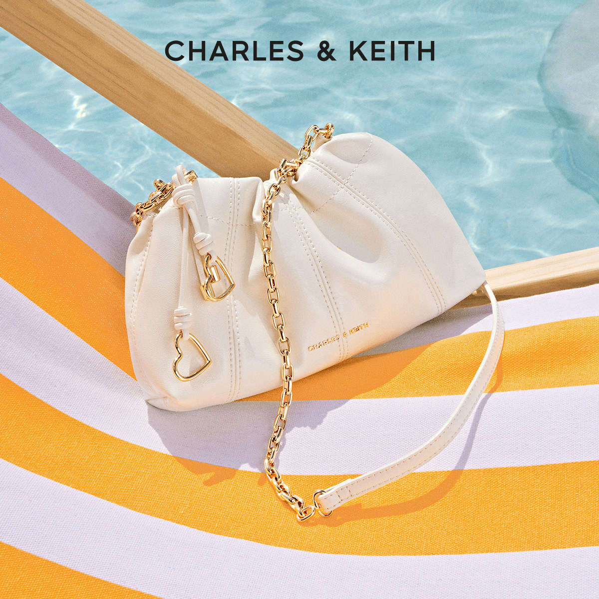 【毕业礼物】CHARLES&KEITH女包CK2-80151612包挂油蜡皮云朵包