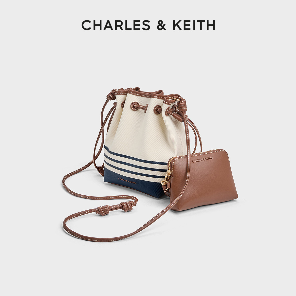 CHARLES&KEITH26夏季新款CK2-10782863-A帆布条纹水桶包斜挎包