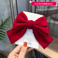 Большая красная заколка для волос с бантиком