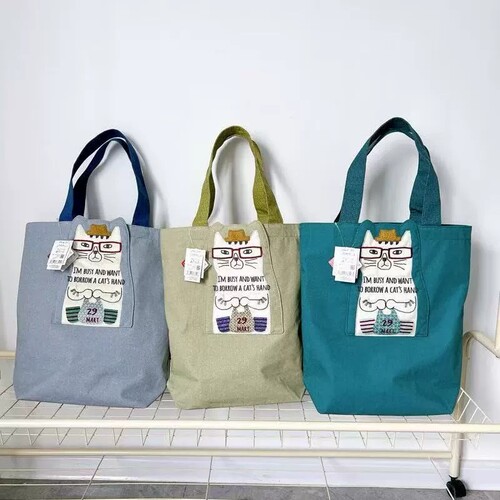 日本Kusuguru正品刺绣眼镜猫单肩包手拎包手提包通勤购物补习400
