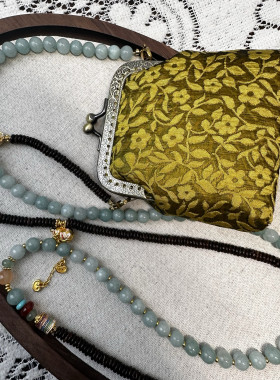 新中式国风复古旗袍包包女款2025新款高级感小众设计手提斜挎包