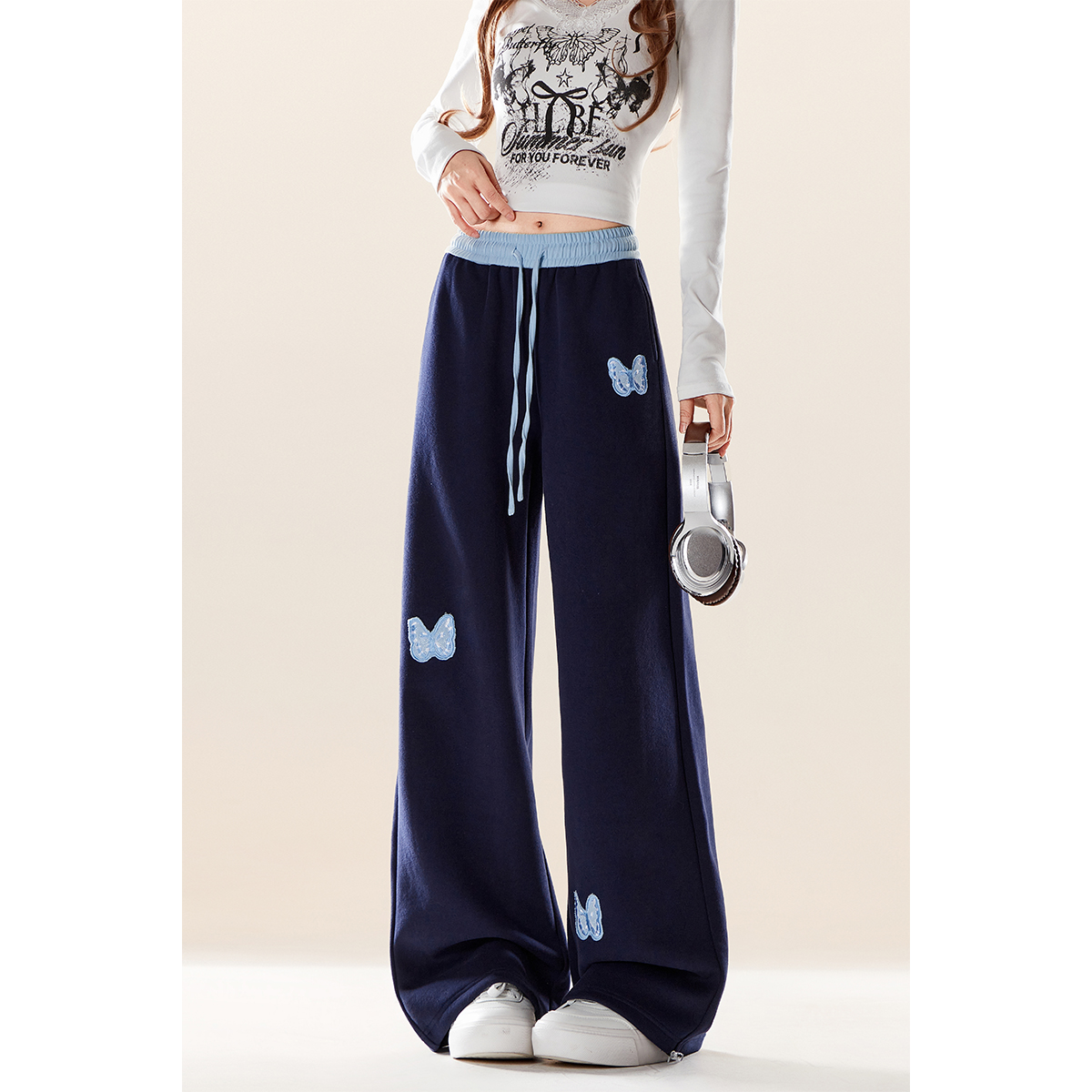 自然涩宝蓝色蝴蝶贴布休闲裤女秋冬季新款撞色拼接腰头直筒长裤子