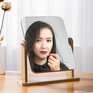 A wooden desktop vanity mirror, featuring a simple and trend