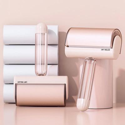 Cream-colored lint roller, tear-off type, for removing lint,