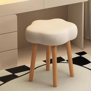 Cream-colored luxurious dressing stool with a high-end feel,