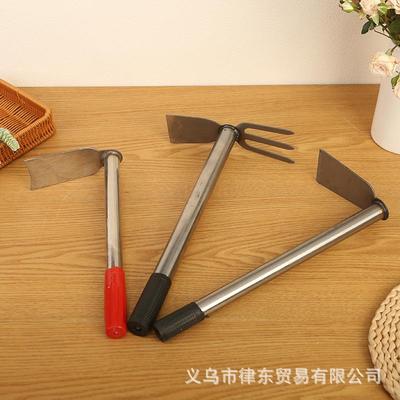 Black-handled hoes, farming tools for planting vegetables an