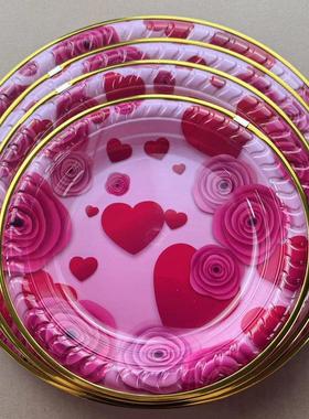 A variety of Valentine's Day plates featuring pink floral an