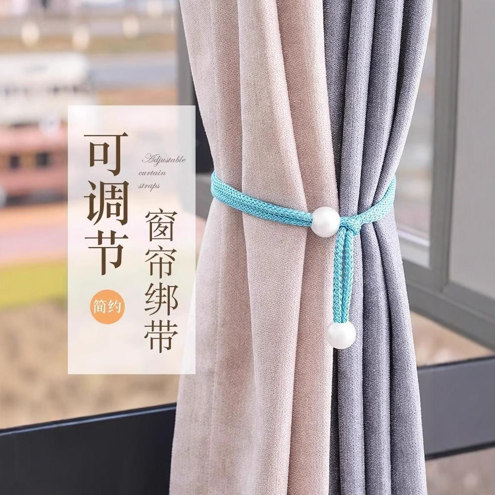 A pair of light luxury pearl curtain tiebacks for living roo