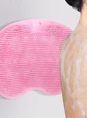 A silicone bath brush that allows you to scrub your back wit