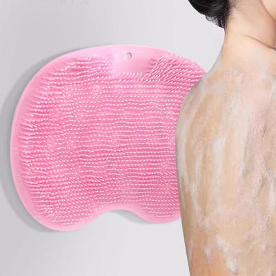 A silicone bath brush that allows you to scrub your back wit