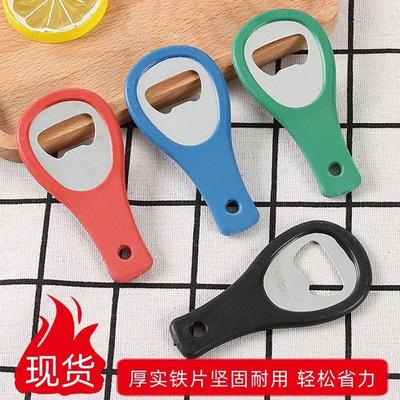 A versatile bottle opener for beer that can be hung and carr
