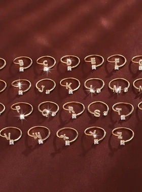 TEMU热销26个英文字母微镶锆石时尚女士戒指 铜镀14K开口素圈现货