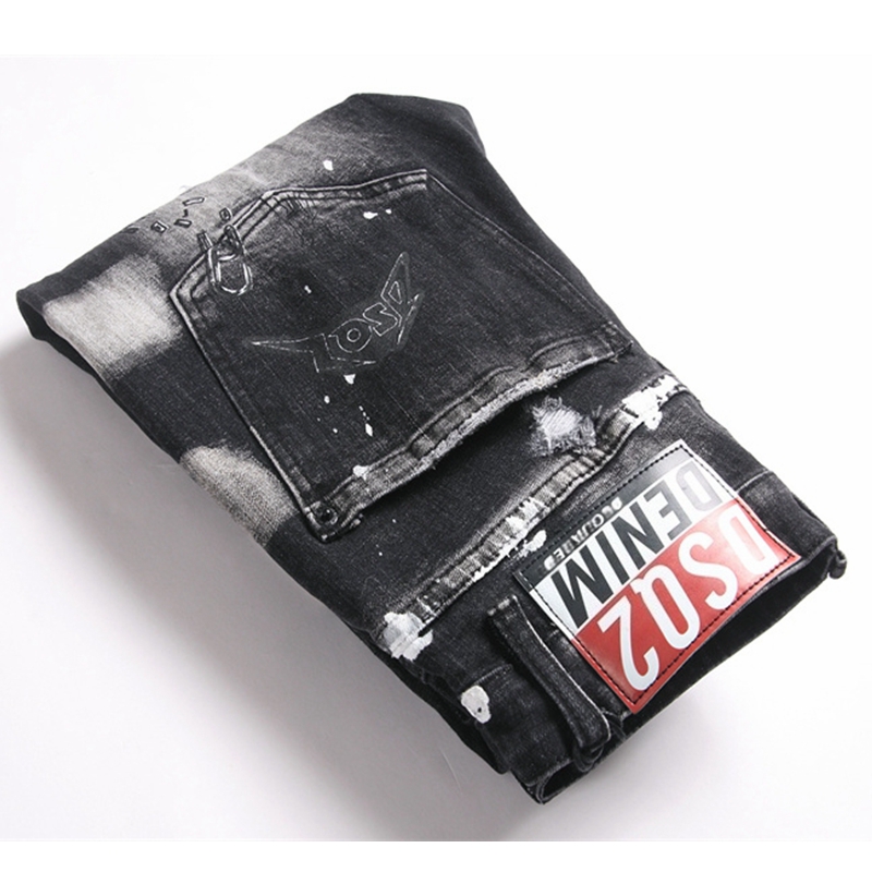 轻奢裤子破洞牛仔裤黑色泼墨补丁潮牌长裤时尚男士弹力修身小脚