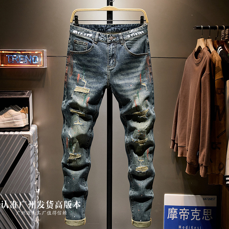 港风乞丐破洞牛仔裤男款韩版潮牌痞帅做旧蓝涂鸦修身小脚2026新款