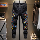 弹力潮牌黑色修身 香港设计感泼墨刮烂破洞补丁男款 牛仔裤 小脚2025