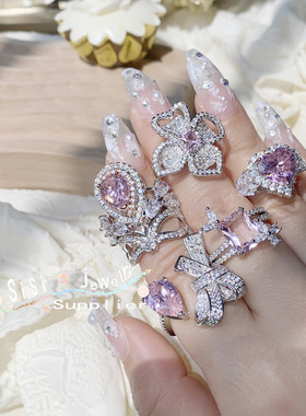 Sisi糖果粉水滴宝石花戒指 精工镀18K 蝴蝶结微镶阿斯切粉锆指环