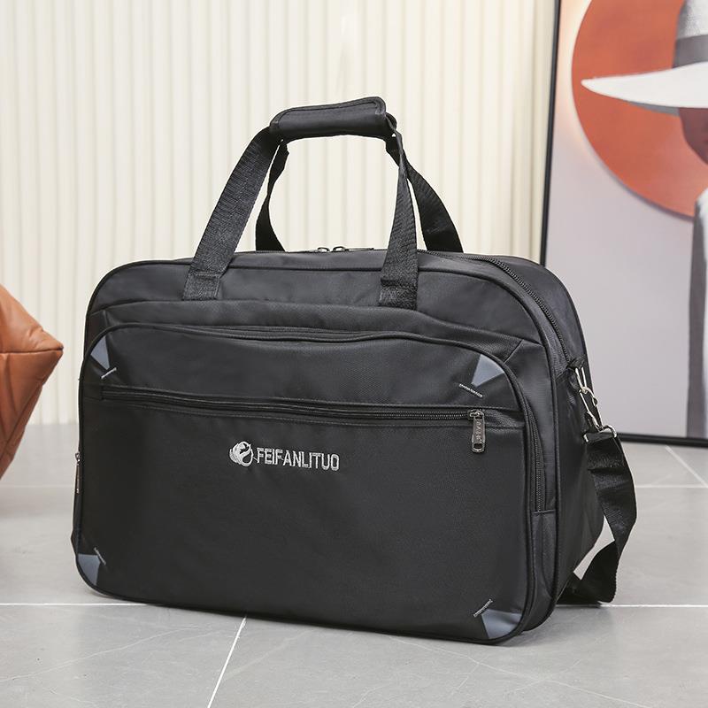 超大容量手提旅行包男女户外旅游行李袋装衣服收纳60升大包牛津布