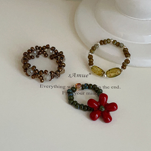 设计感花朵弹力绳串珠戒指女气质独特小众时尚潮流百搭指环戒子