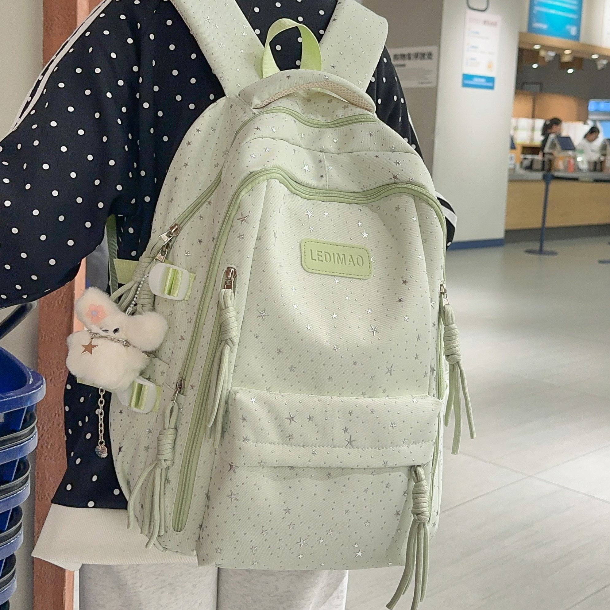 专柜正品可爱书包女韩版森系亮片星星印花双肩包初中高中大学生上