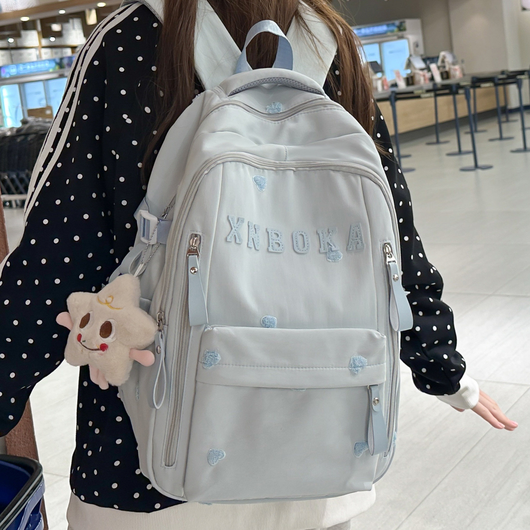 专柜正品时尚书包女日韩风简约百搭纯色字母双肩包初中高中大学生