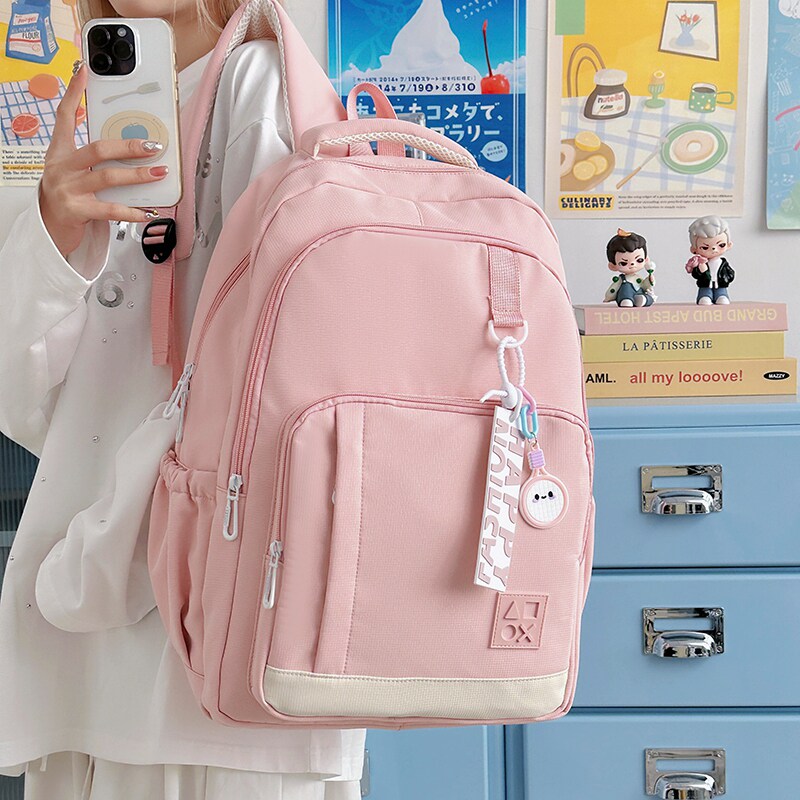 专柜正品书包女少女风粉色双肩包女小学生大容量百搭书包韩版休闲