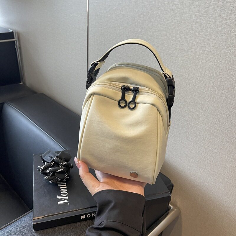 日本专柜贝壳单肩女包休闲百搭女手机包
