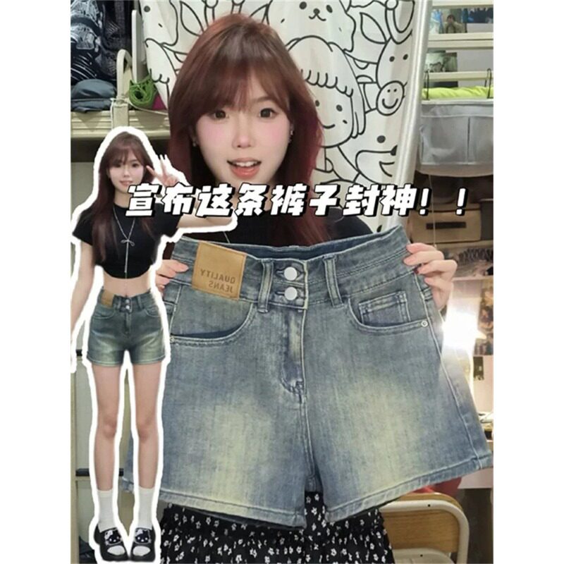 蓝色设计感双扣高腰不露屁股牛仔短裤女2026新款夏季包臀三分热裤
