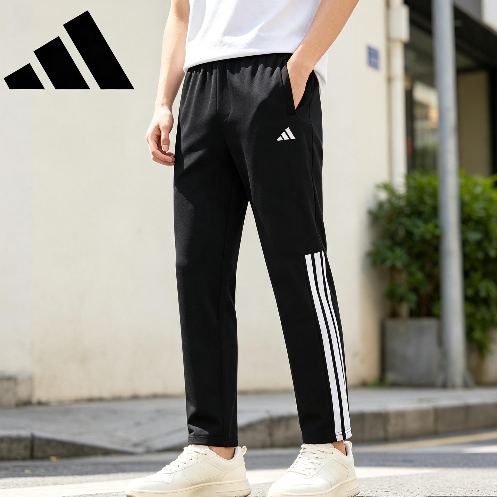 Adidas阿迪达斯男士直筒裤子秋季运动弹力防风长裤三条纹休闲卫裤