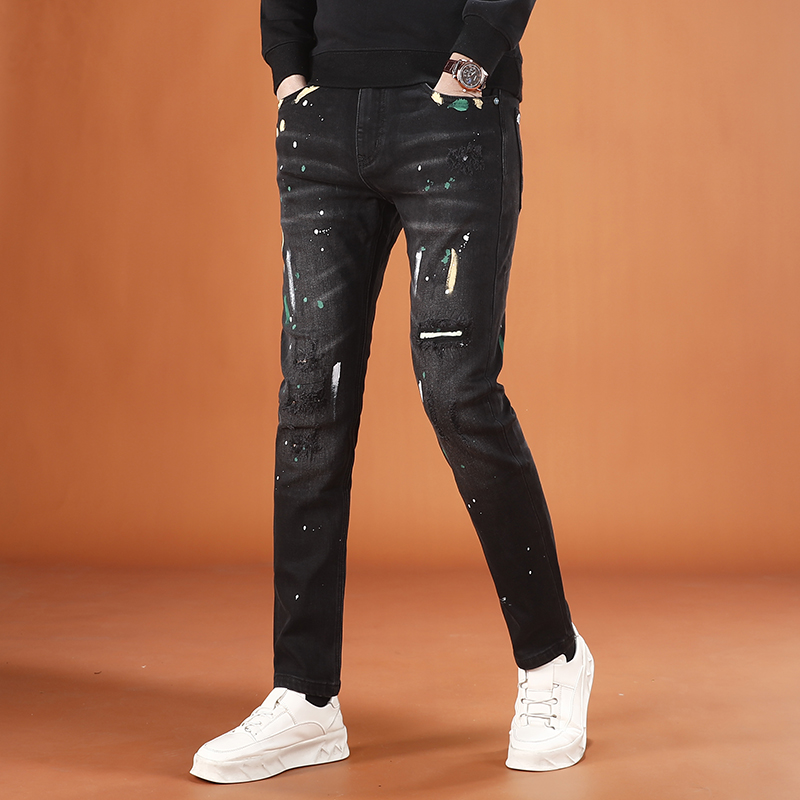 秋季黑色泼墨印花破洞牛仔裤男