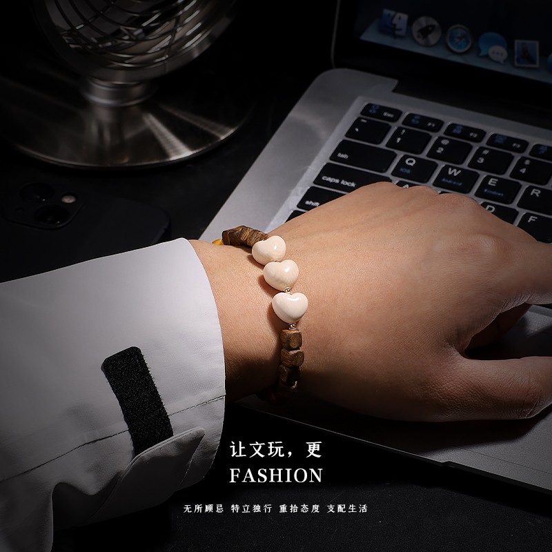 2025原色冰料猛犸象牙蓝皮雕刻爱心隔珠手串吊坠背云挂件手串DIY