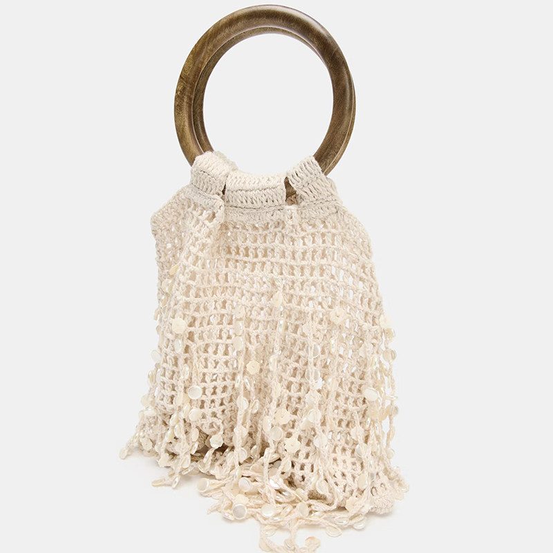 2026春季新款仙女钩针编织包流苏手提包木质圆环贝壳镂空包包女潮