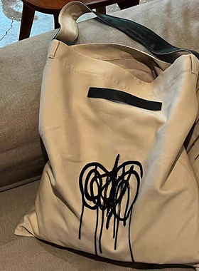 小众设计涂鸦印花帆布包女2026新款单肩包慵懒托特包流浪包大容量