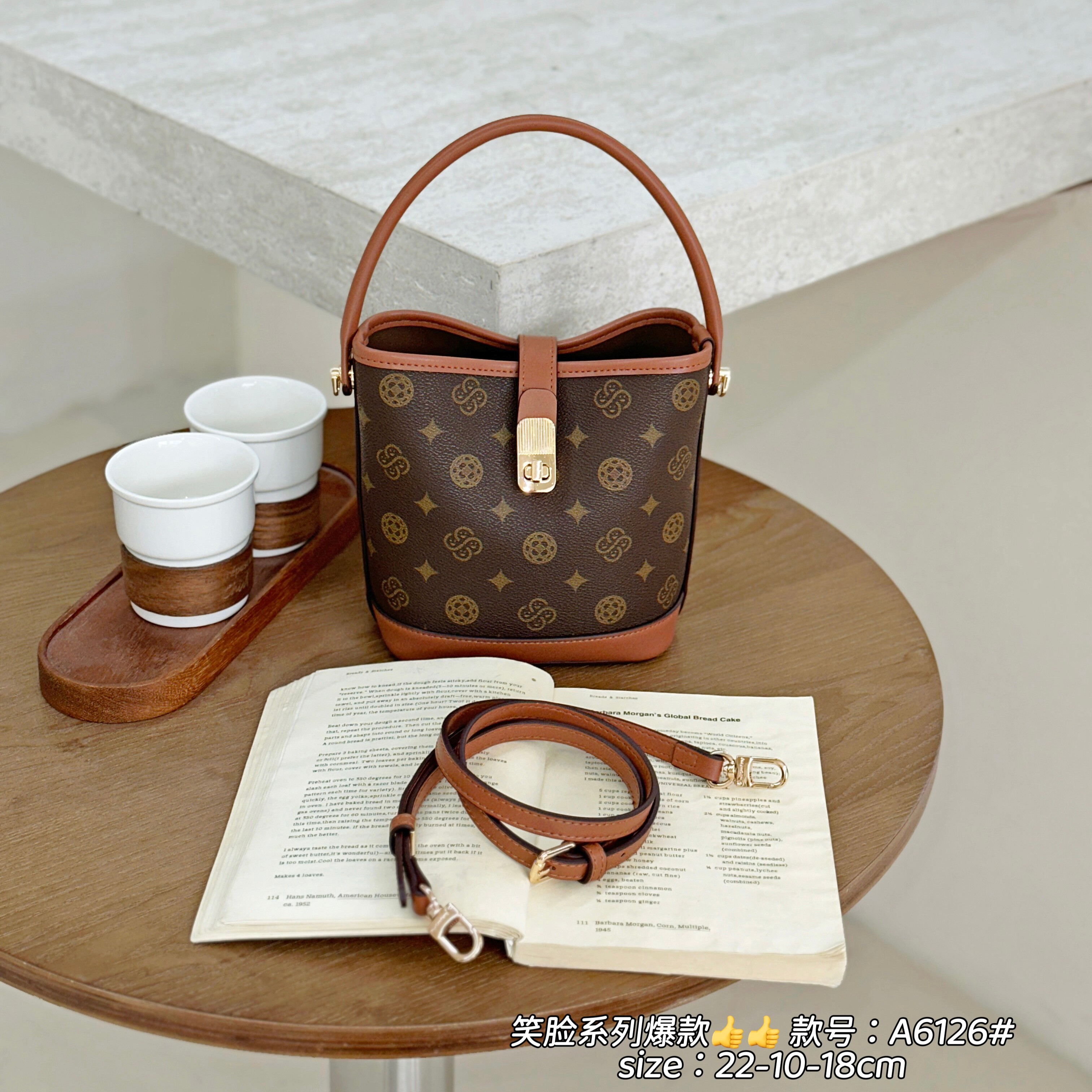 小红书推荐女包笑脸水桶包女2026新款印花百搭大容量手提单肩斜挎
