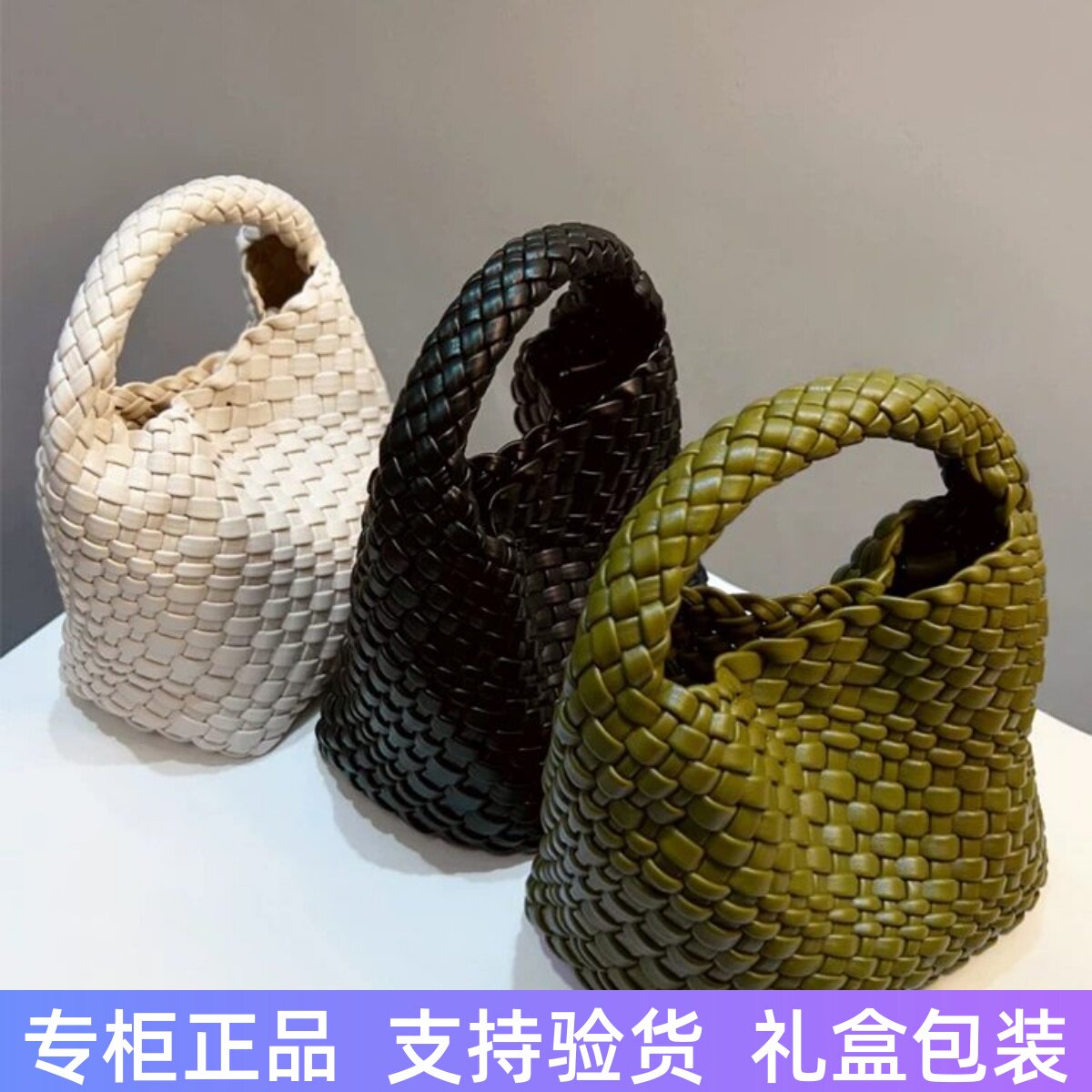 香港真皮手工编织小水桶包包女2026新款高级感手提单肩斜挎包