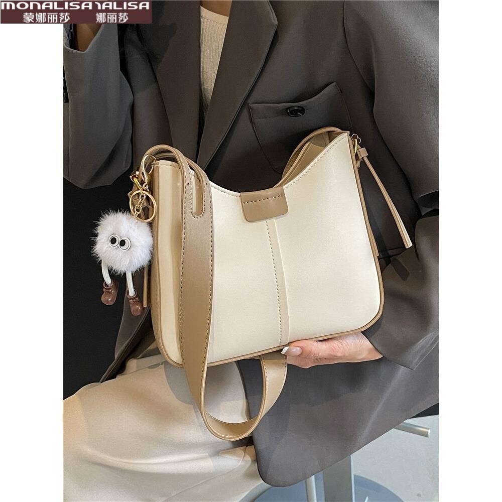 蒙娜丽莎官方正品今年流行包包女夏2025新款百搭单肩水桶包高级质