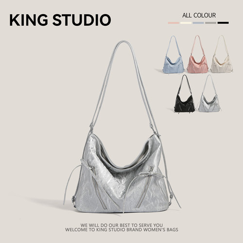 冰川银蝴蝶结双肩包女2025新款时尚韩国托特包休闲大容量单肩背包