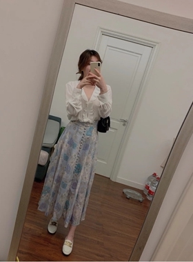 2021雏菊印花扣饰高腰波浪半身裙SFPJU00488