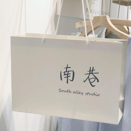 服装店袋子定做女装店纸袋手提袋定制童装购物袋加厚