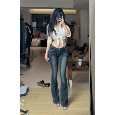 深色三角腰弹力微喇叭牛仔长裤