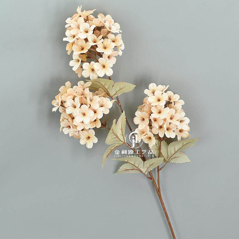 Three pagoda hydrangea wedding paths decorated with fake hyd