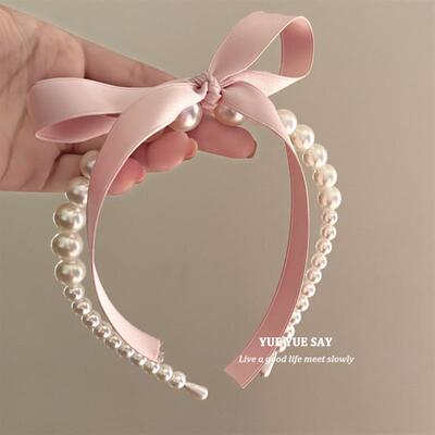 My sister, the old French pearls, the pink butterflies, the