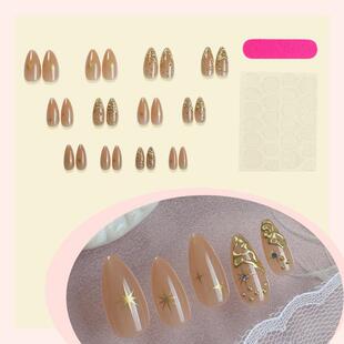 Twenty-four pieces of gold-coloured patches in a cape-O-M-M-