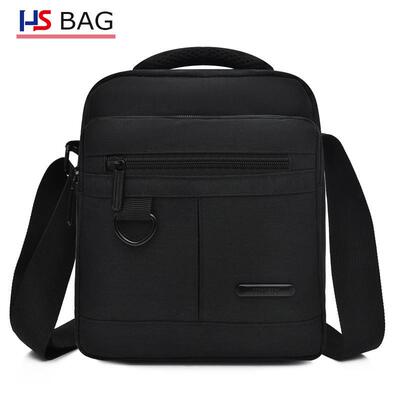 A man with a single shoulder bag, a multi-story slant bag, a