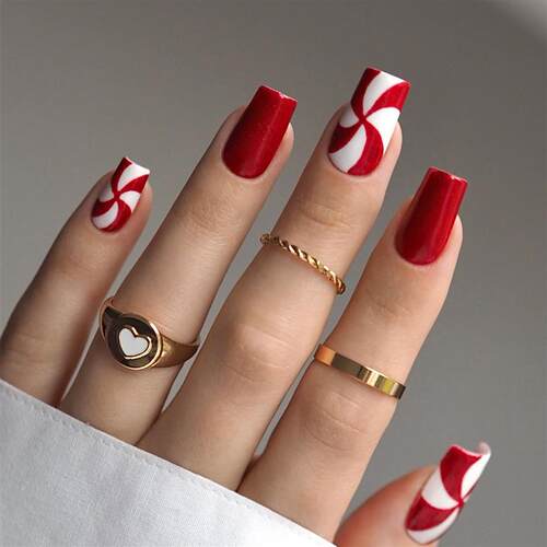 For Christmass candy strips, fake nails are red-coloured an