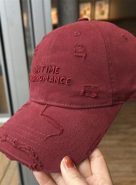 The girl with a holed baseball cap is embroidered with a tam